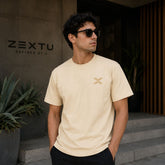 ZEXTU™ X Logo Tee — Cream